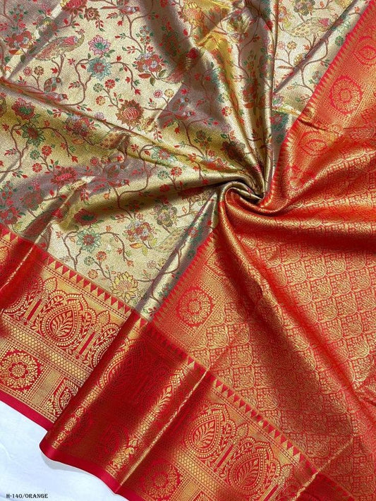 Traditional Dharmavaram saree with gold zari floral design and red orange border
